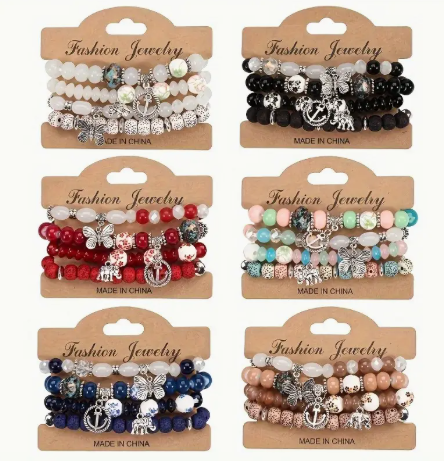 Boho Beaded Bracelet Set – 4-Piece Stack with Charms (Elephant, Butterfly, Anchor)