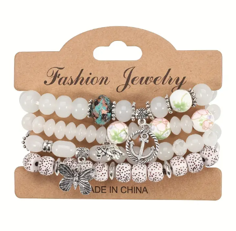 Boho Beaded Bracelet Set – 4-Piece Stack with Charms (Elephant, Butterfly, Anchor)