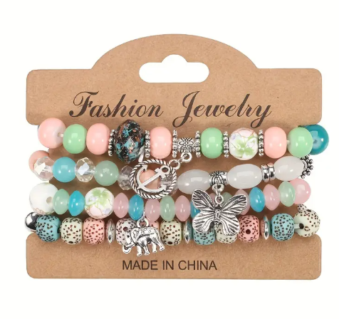 Boho Beaded Bracelet Set – 4-Piece Stack with Charms (Elephant, Butterfly, Anchor)